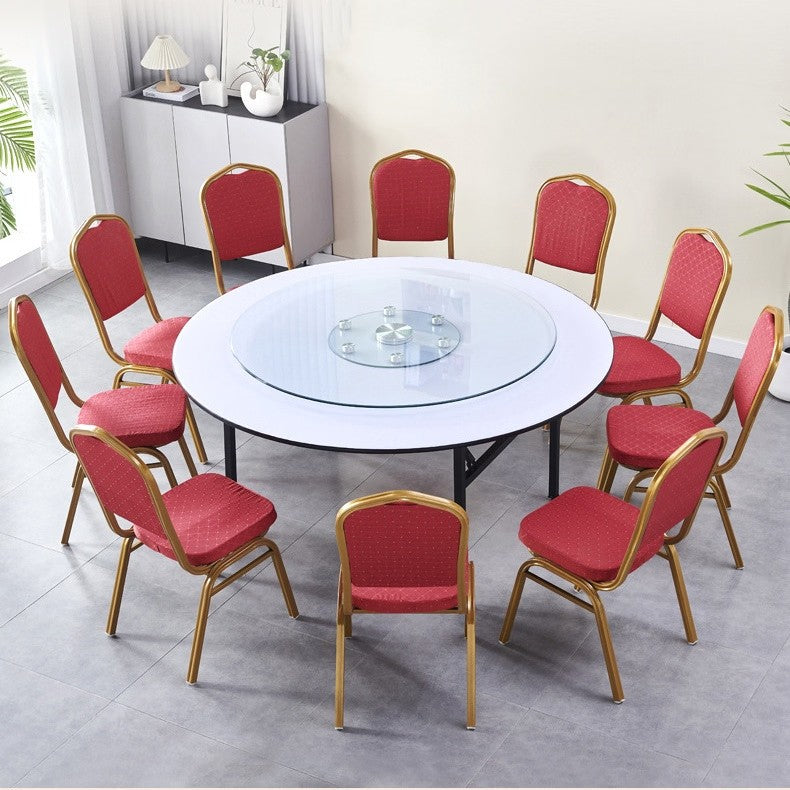 White folding round table with a central glass turntable and banqueting chairs